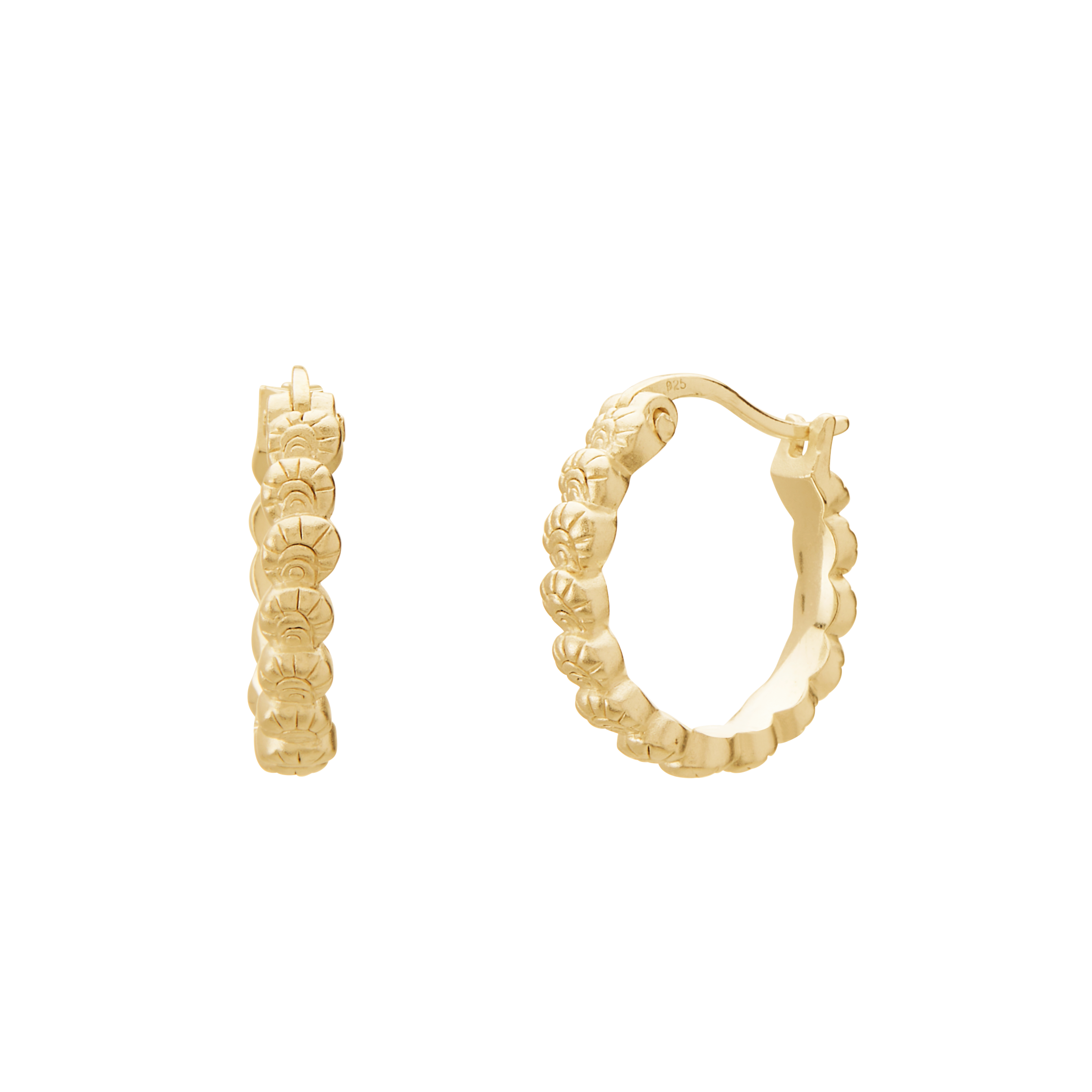Gold hoop earrings with intricate designs on a white background